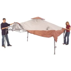 Coleman 13 X 13 Canopy Sun Shelter, Khaki 9 Coleman 13 X 13 Canopy Sun Shelter, Khaki -Camp To Explore Shop 2000023972 Step2